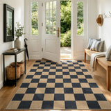 Covaba checkered easy jute natural indoor/outdoor area rug in ink black, styled in a room setting, view 8