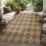Covaba geometric checkered easy jute indoor/outdoor area rug in dune khaki, styled in a room setting, view 10