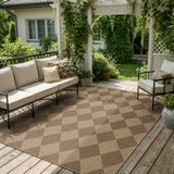 Covaba geometric checkered easy jute indoor/outdoor area rug in dune khaki, styled in a room setting, view 11