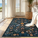 Covaba boho botanical floral area rug in stormy blue, styled in a room setting, view 7