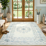 Covaba vintage traditional floral area rug in stormy blue, styled in a room setting, view 12