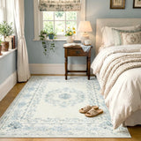 Covaba vintage traditional floral area rug in stormy blue, styled in a room setting, view 14