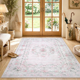 Covaba vintage traditional floral area rug in blush clay, styled in a room setting, view 5