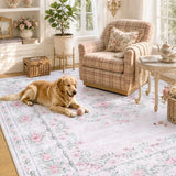 Covaba vintage traditional floral area rug in blush clay, styled in a room setting, view 8