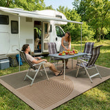 Covaba rainbow easy jute black/beige indoor/outdoor area rug in warm beige, styled in a room setting, view 4