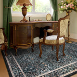 Covaba maximalism vintage french floral area rug in ink black, styled in a room setting, view 2