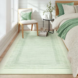 Covaba modern minimalist line area rug in fern green, styled in a room setting, view 4