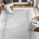 Covaba modern minimalist line area rug in pearl grey, styled in a room setting, view 2