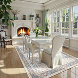 Covaba vintage floral bird area rug in fern green, styled in a room setting, view 2