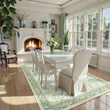 Covaba vintage floral bird area rug in willow sage, styled in a room setting, view 3