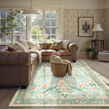 Covaba vintage floral bird area rug in willow sage, styled in a room setting, view 2