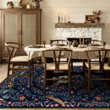 Covaba fantasy garden and unicorn area rug in deep navy, styled in a room setting, view 4