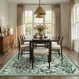 Covaba vintage woodcut forest and rabbit area rug in fern green, styled in a room setting, view 4