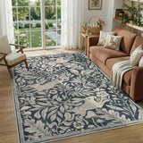 Covaba vintage woodcut forest and rabbit area rug in pearl grey, styled in a room setting, view 4