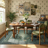 Covaba ancient egyptian revival cat area rug in fern green, styled in a room setting, view 5