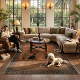 Covaba ancient egyptian revival cat area rug in faded rose, styled in a room setting, view 3