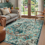 Covaba bohemian floral medallion area rug in teal haze, styled in a room setting, view 8