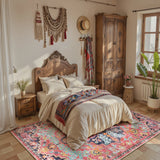Covaba bohemian floral medallion area rug in faded rose, styled in a room setting, view 4
