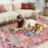 Covaba bohemian floral medallion area rug in faded rose, styled in a room setting, view 5