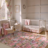 Covaba forest woodland area rug in blush clay, styled in a room setting, view 6