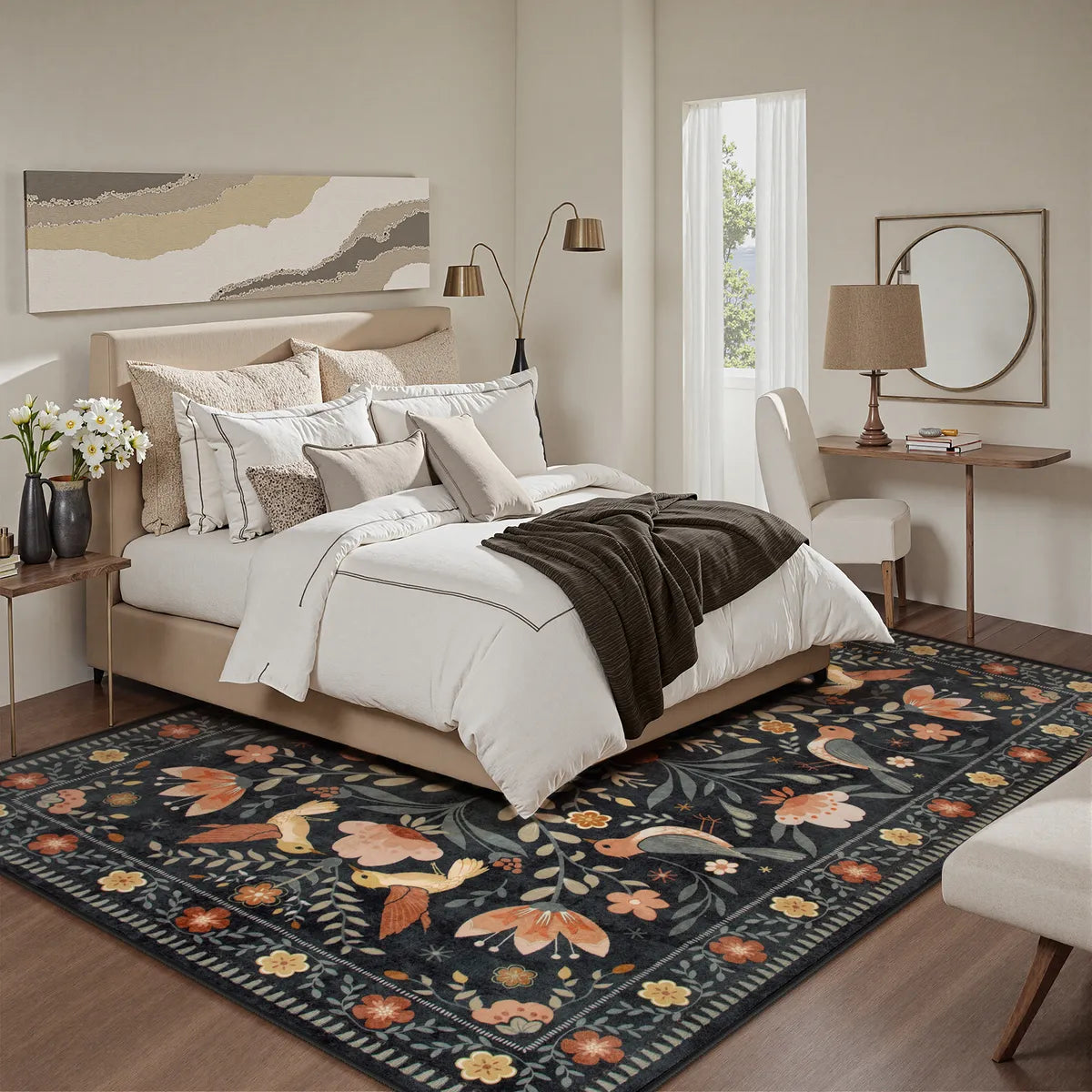 Covaba boho birdsong floral garden area rug in ink black, styled in a room setting