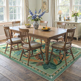 Covaba egyptian-inspired botanical area rug in fern green, styled in a room setting, view 4