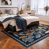 Covaba egyptian-inspired botanical area rug in deep navy, styled in a room setting, view 3
