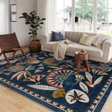 Covaba egyptian-inspired botanical area rug in deep navy, styled in a room setting