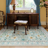 Covaba boho modern parisian garden floral area rug in stormy blue, styled in a room setting, view 8
