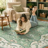 Covaba vintage botanical scalloped area rug in fern green, styled in a room setting, view 9
