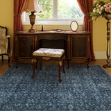 Covaba vintage persian distressed area rug in stormy blue, styled in a room setting, view 7