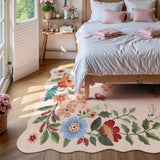 Covaba boho modern parisian floral scalloped area rug in soft blush, styled in a room setting, view 5