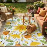 Covaba floral indoor outdoor area rug in golden wheat, styled in a room setting, view 2