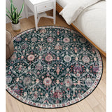 Covaba ultra-thin vintage floral moroccan trellis round rug in ink black, shown flat on a plain ivory backdrop