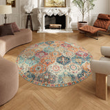 Covaba ultra-thin vintage floral moroccan trellis and round rug in faded rose, styled in a room setting