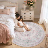 Covaba vintage traditional floral round rug in blush clay, styled in a room setting, view 3