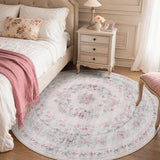 Covaba vintage traditional floral round rug in blush clay, styled in a room setting