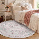 Covaba vintage traditional floral round rug in blush clay, styled in a room setting, view 2