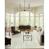 Covaba abstract rainbow stripe green/white area rug in fern green, shown flat on a plain ivory backdrop, view 8