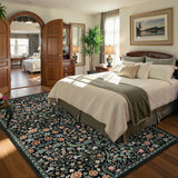 Covaba maximalism vibrant blossom floral area rug in ink black, styled in a room setting, view 6