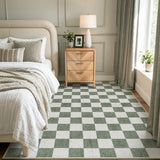 Covaba modern checkerboard area rug in olive grove, styled in a room setting, view 10