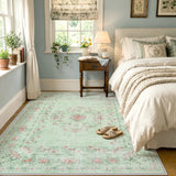 Covaba vintage traditional floral area rug in fern green, styled in a room setting, view 17