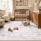Covaba vintage traditional floral area rug in blush clay, styled in a room setting, view 13