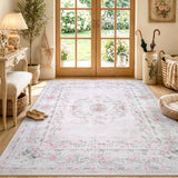 Covaba vintage traditional floral area rug in blush clay, styled in a room setting, view 10