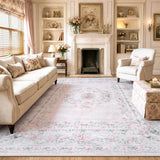Covaba vintage traditional floral area rug in blush clay, styled in a room setting, view 9