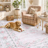 Covaba vintage traditional floral area rug in blush clay, styled in a room setting, view 11