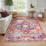 Covaba bohemian floral medallion area rug in faded rose, styled in a room setting, view 6