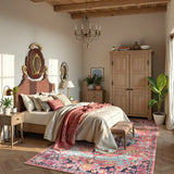 Covaba bohemian floral medallion area rug in faded rose, styled in a room setting, view 7