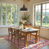 Covaba bohemian floral medallion area rug in faded rose, styled in a room setting, view 9