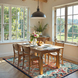 Covaba bohemian floral medallion area rug in amber clay, styled in a room setting, view 6